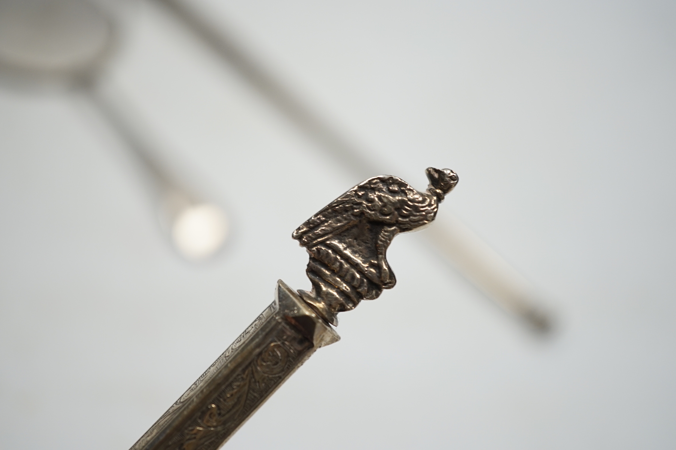 A George V silver biscuit server, a Dutch white metal combination fork and spoon and a late Victorian silver hunting horn, by Sampson Mordan & Co, London, 1900?, 30.2cm.